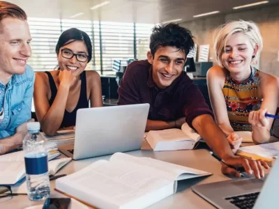 Multiethnic,Group,Of,Young,People,Studying,Together,At,A,Table Create an LMS Website with LearnPress